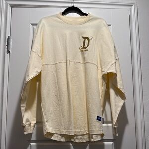 Disneyland Cream/White spirit jersey with gold letters NWT size medium